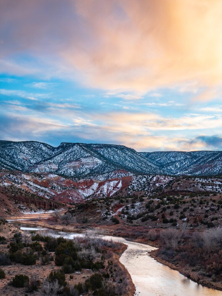New Mexico desert landscape with river and delicate snow